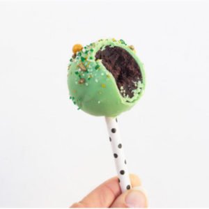 Green Cake Pop With Bite Taken Out