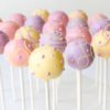 Cake Pops In Pink, Purple and Yellow with fun swirls