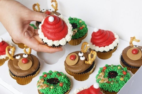 Holiday Themed Cupcakes with Santa Hat, Reindeer and Wreaths